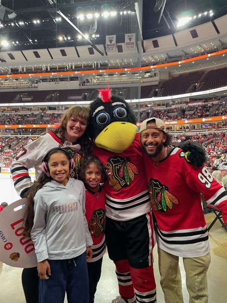 My family posing with Tommy Hawk.